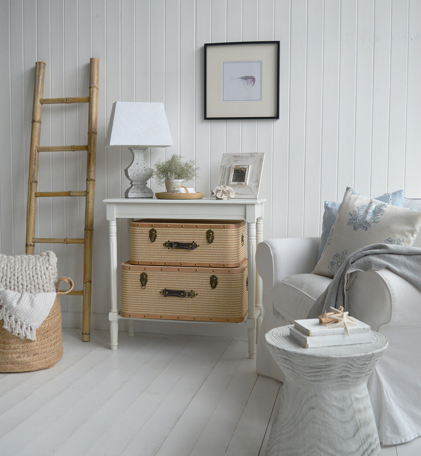 Layered neutrals, gentle blues, and weathered textures reflect the effortless beauty of New England coastal interiors.