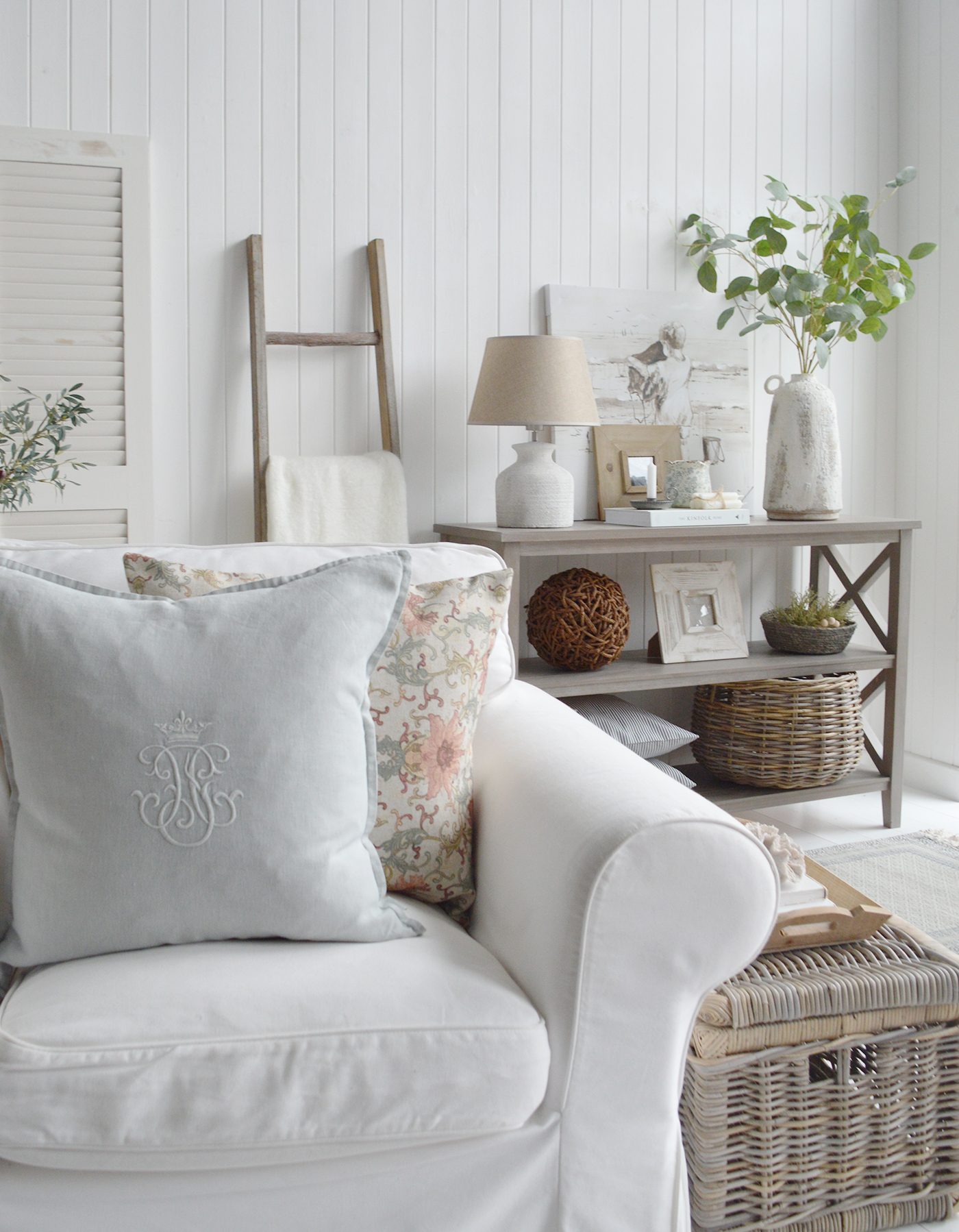 Layering pieces of furniture create a room full of interest for a relaxed modern farmhouse feel