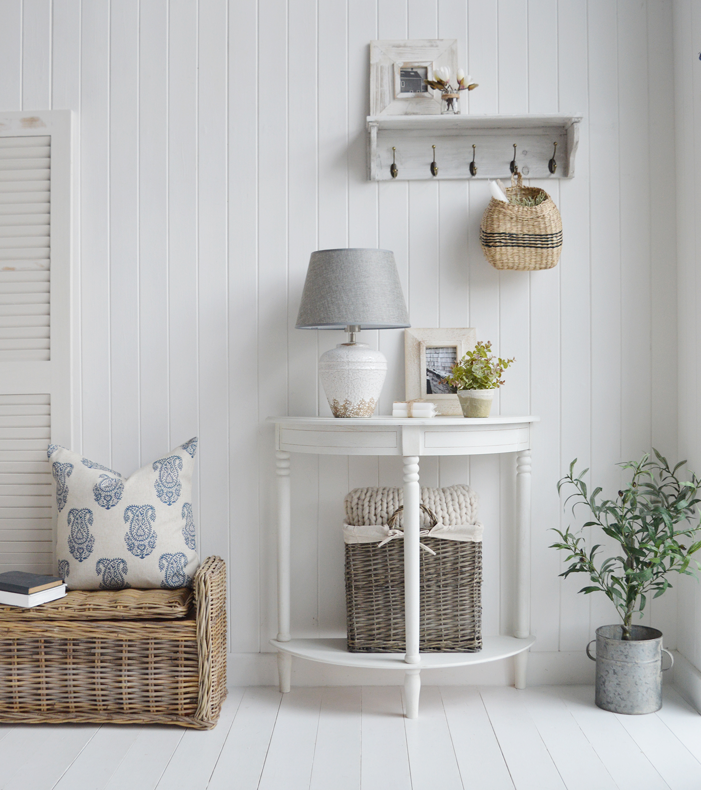 White Console table with a shelf in a hal moon shape for narrow hallways in New England style homes, a perfect little piece for coastal furniture