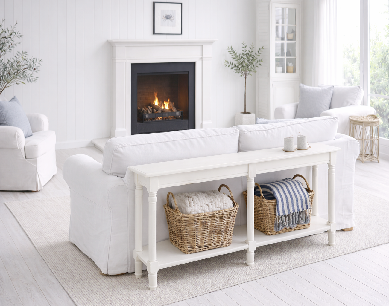 The Cape Ann Large Console Table is a beautifully crafted white coastal console designed to bring relaxed New England charm to beach house interiors, hallways and light-filled living rooms.