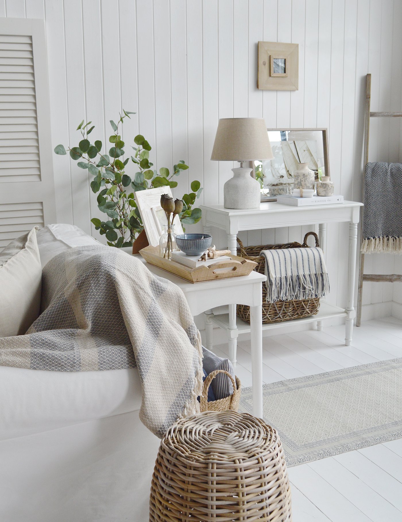 The simple white Cape Ann as a sofa table alongside the origianl Cape Ann to break up a large interior space