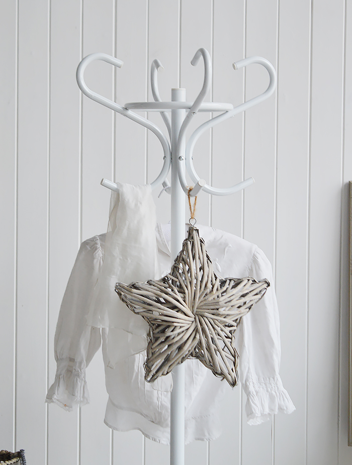 Traditional white coat stand. Hat and coasts rack for New England home and interiors coat storage