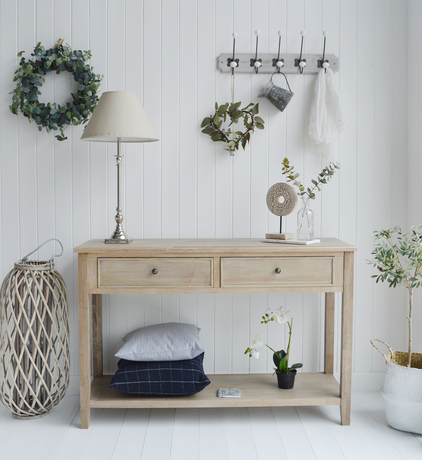 The Berkshire large console table with two drawers and a shelf in a natural wood colour.

A statement piece of furniture in a timeless simple design with clean straight lines for your hallway or living room.

Inspired in our New England style to create bright, airy and relaxing homes, the Berkshire table, in a slightly washed wood colour complements all homes whether you are by the sea, in the country or the city.