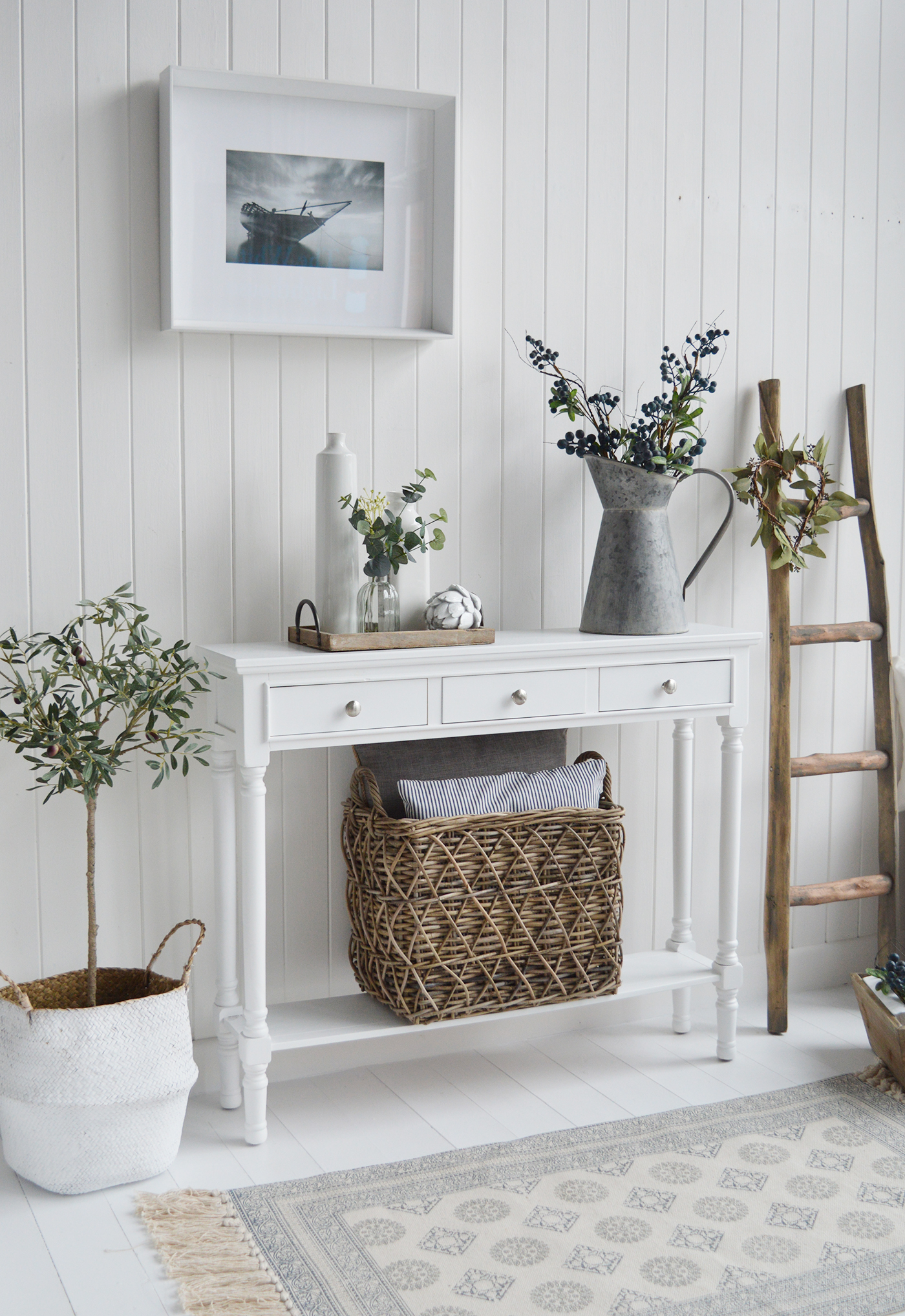 The Georgetown white console table with the silver handles on each of the three drawers