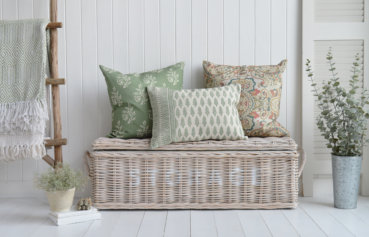 The White Farmington storage bench blends seamlessly into a coastal setting with its clean lines and cottage-inspired design. Its distressed white finish echoes the sun-bleached tones of driftwood and seashells. Tucked beneath a window or near the entryway, it provides both seating and a convenient spot to organize seaside essentials.