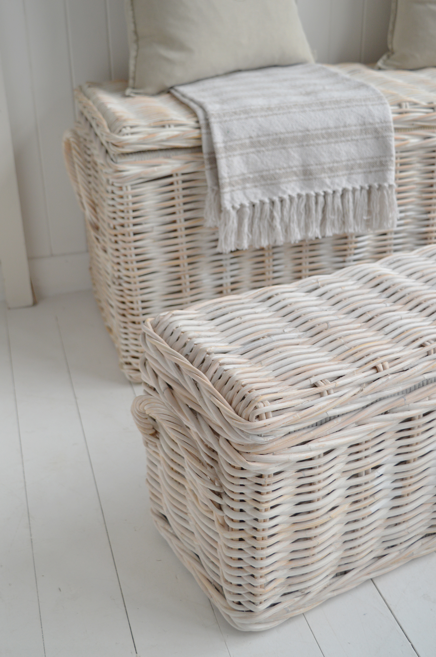 Its weathered whitewash and handwoven texture bring a touch of coastal calm to the room, making the Farmington bench as inviting as it is useful.