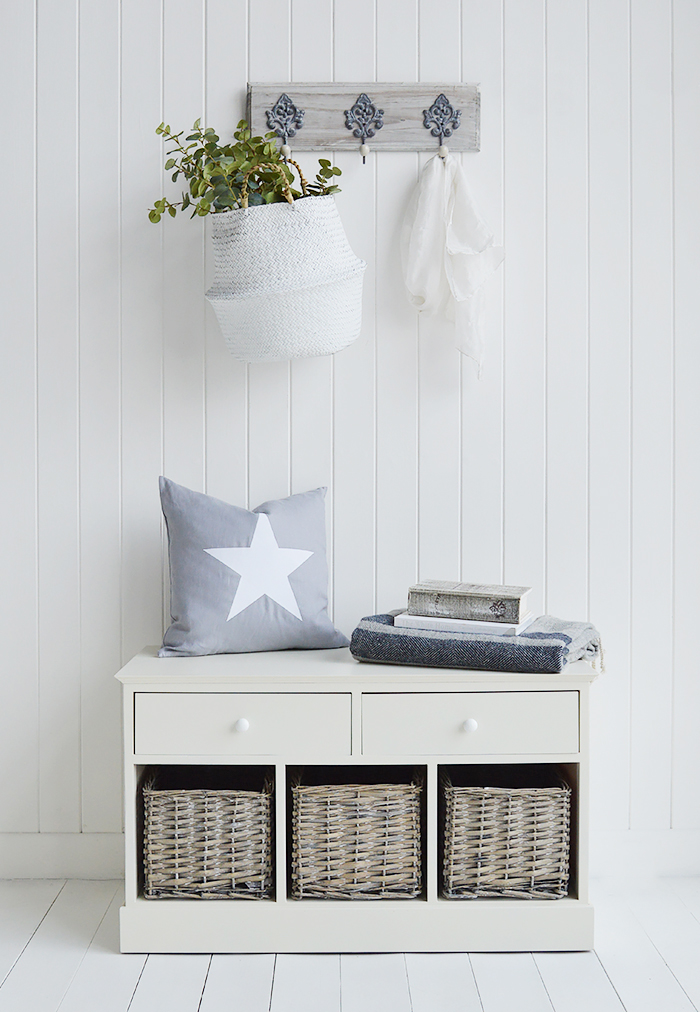 Newbury cream storage bench seat in hall with coat rack. The Bench has 3 basket drawers and 2 larger drawers