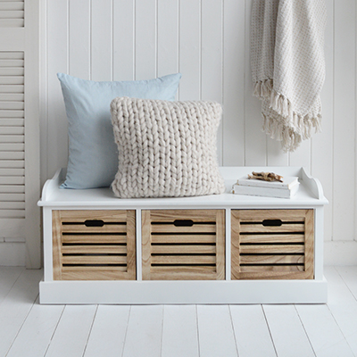 Shop the Northport Storage Bench – a white and natural wood coastal seat with three slatted drawers. Ideal for Hamptons-style entryways, mudrooms, and beach house interiors