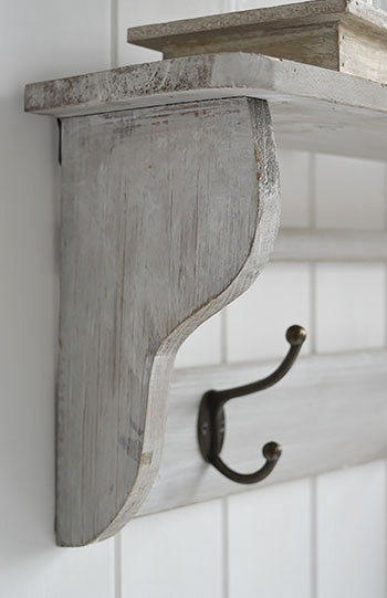 Parisian grey wall shelf with hooks. Four double hooks for coats. Simple hall furniture