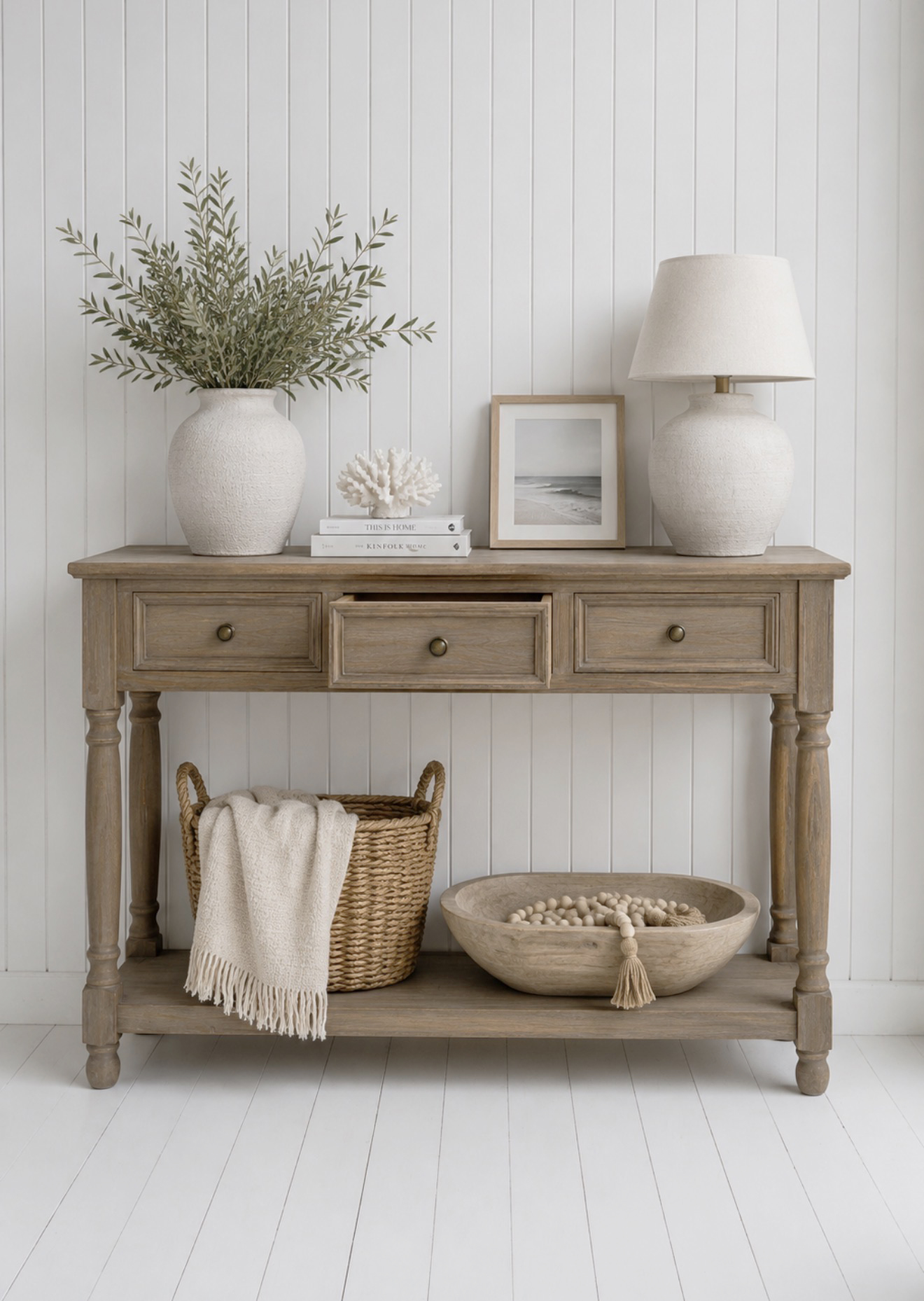 The Portsmouth Console Table is a beautifully crafted wooden console table that brings timeless New England, Hamptons and coastal style to hallways, living rooms and entrance spaces.
