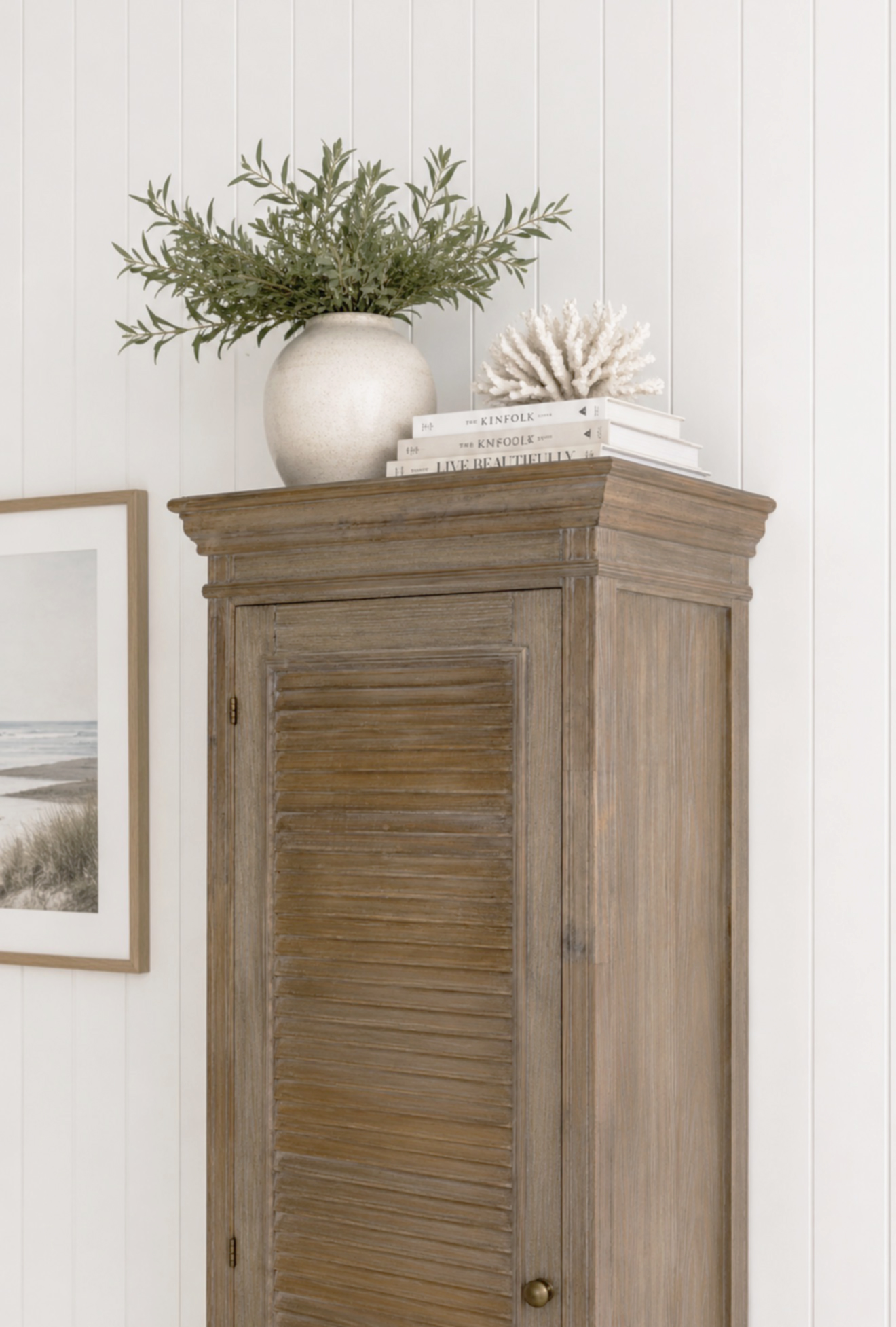 A beautifully proportioned tall storage cupboard that blends effortlessly with coastal décor, farmhouse interiors and relaxed beach house styling.