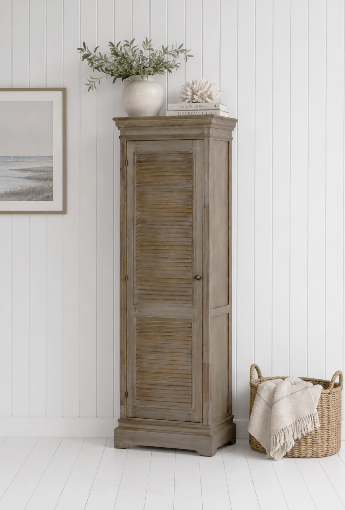 Add timeless coastal style to your home with this tall wooden cupboard, perfect for creating elegant storage in New England, Hamptons and modern country interiors.