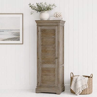     Add timeless coastal style to your home with this tall wooden cupboard, perfect for creating elegant storage in New England, Hamptons and modern country interiors.