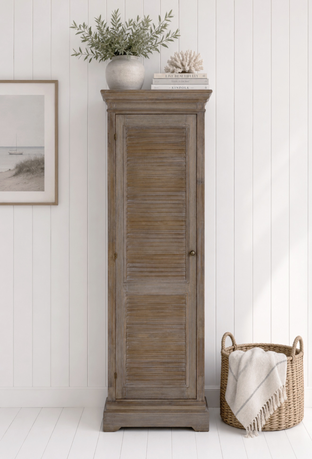 Crafted from beautifully weathered wood, this coastal storage cabinet combines classic design with generous shelving to keep your home organised in style.