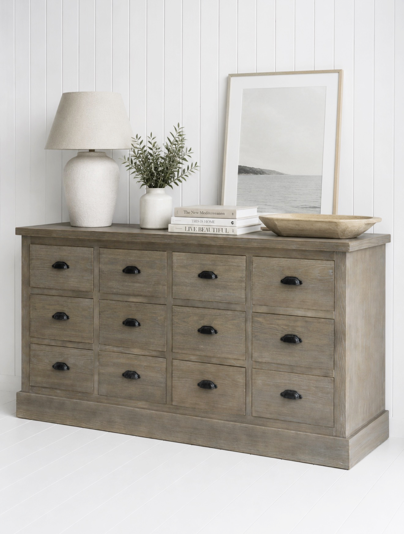 The clean lines, rustic wood grain and classic cup handles create a versatile piece that complements modern coastal, farmhouse and country home décor.