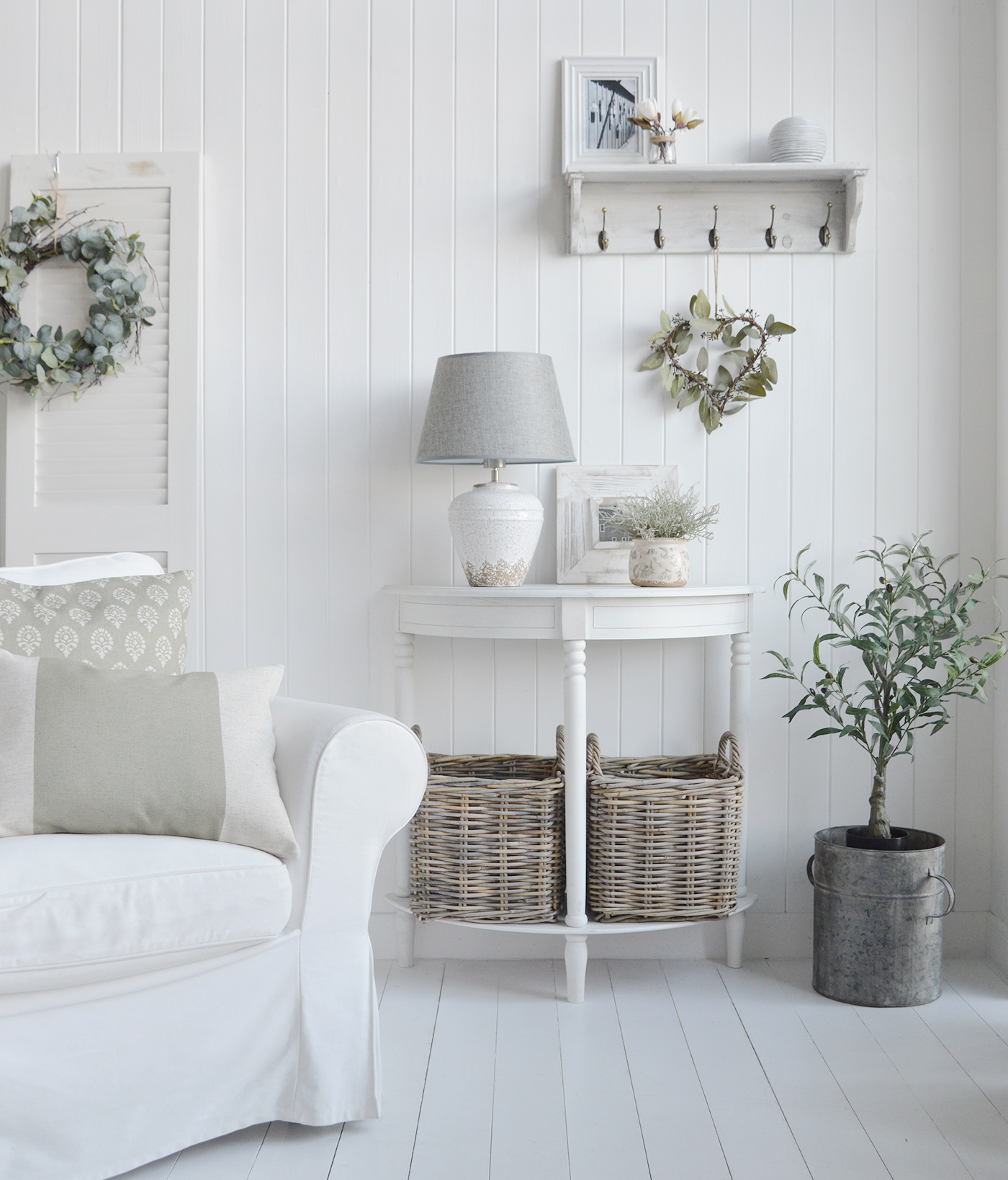 Cape Ann aged narrow white console table  with a shelf for New England interiors, perfect furniture for coastal, modern farmhouse and country homes. Pair your white furniture with natural elements commonly found in coastal hall settings. Incorporate accessories like driftwood, seashells, sisal rugs, or jute baskets to create a harmonious balance between the crispness of the white furniture and the organic textures of the coastal environmentPair your white furniture with natural elements commonly found in coastal settings. Incorporate accessories like driftwood, seashells, sisal rugs, or jute baskets to create a harmonious balance between the crispness of the white furniture and the organic textures of the coastal environment