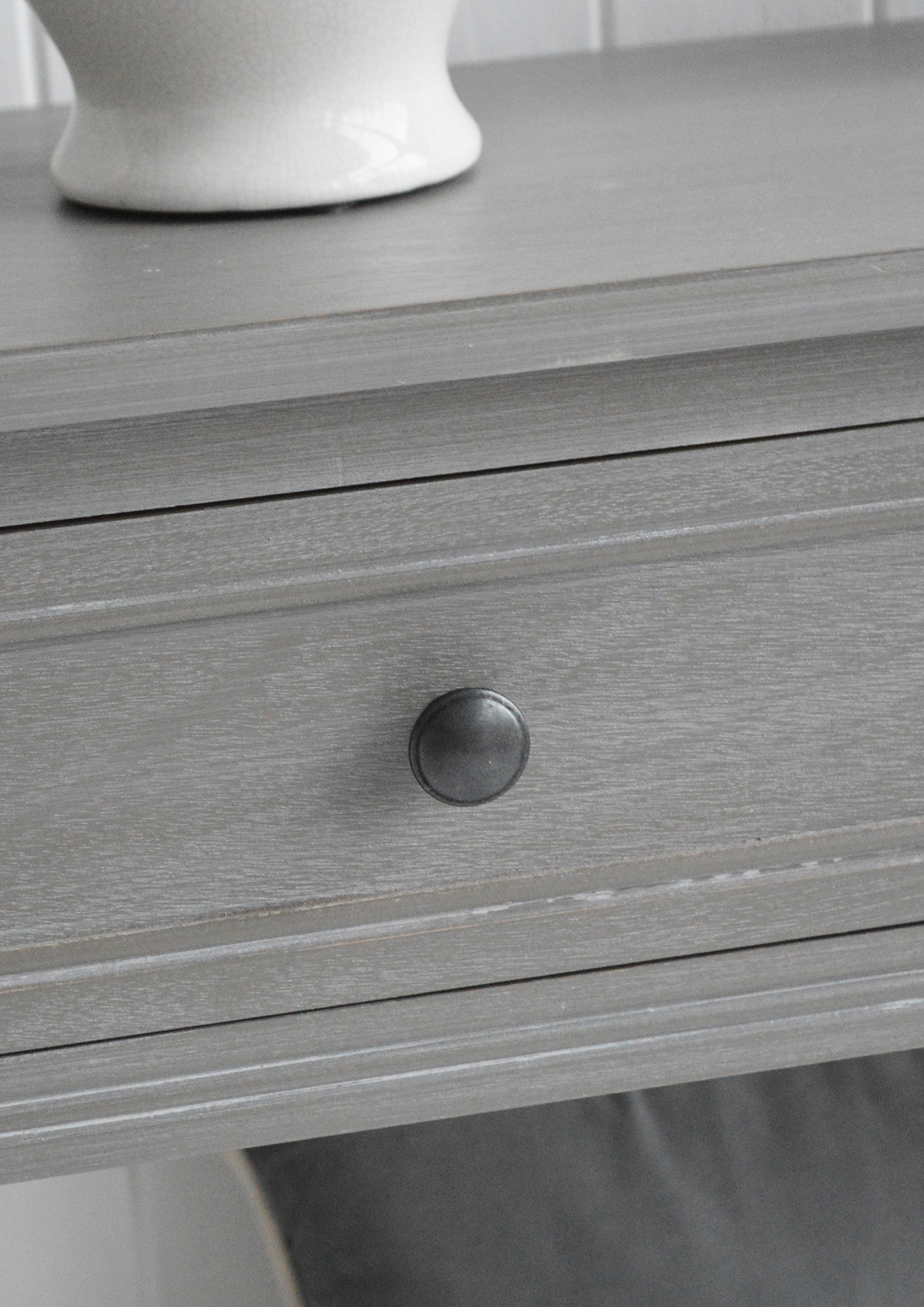 The Sudbury Console Table reflects the essence of coastal furniture, with clean lines and a finish inspired by driftwood tones.