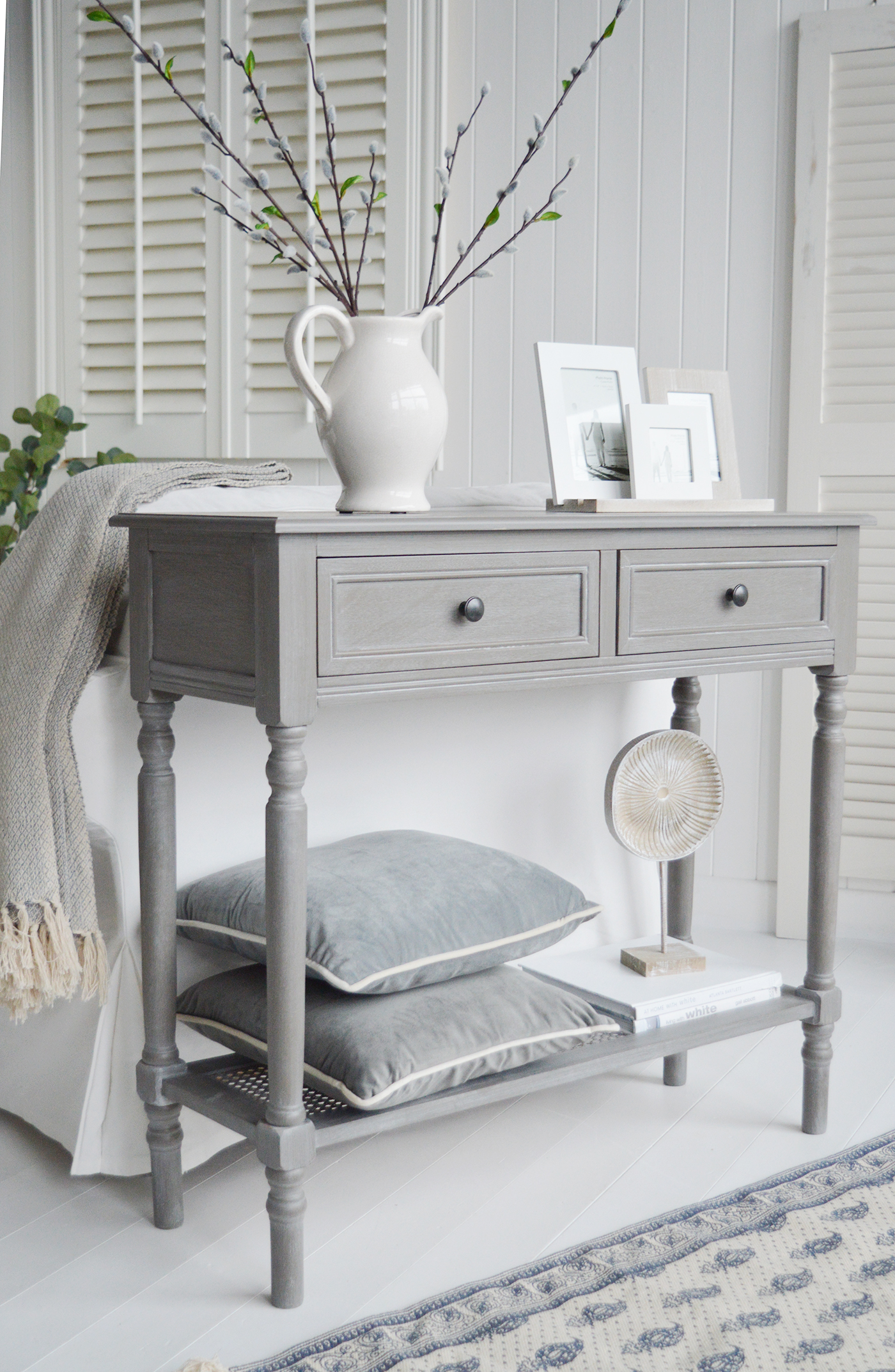 The elegant design of the Sudbury Console Table enhances coastal interiors with timeless New England charm.