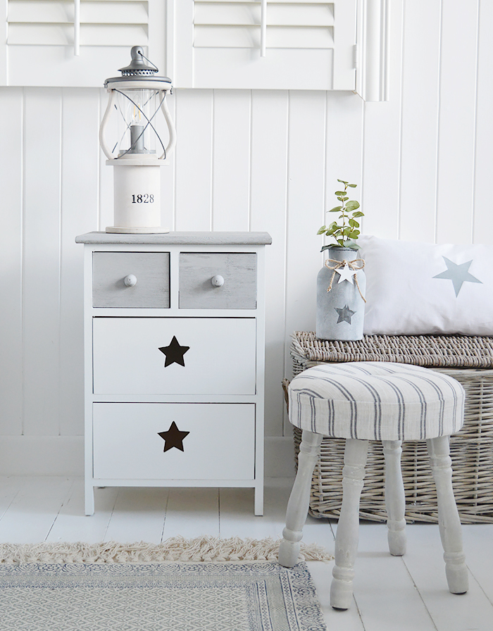Plymouth wooden cabinet with four drawers in white and grey with cut out star decor from The White Lighthouse for hallway, bedroom and living room furniture. New England country, coastal and city white furniture