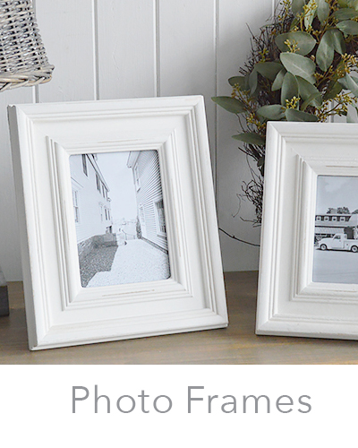 White photo frames, wall and wooden portrait and landscape 5x7, 6x4 and 10x8