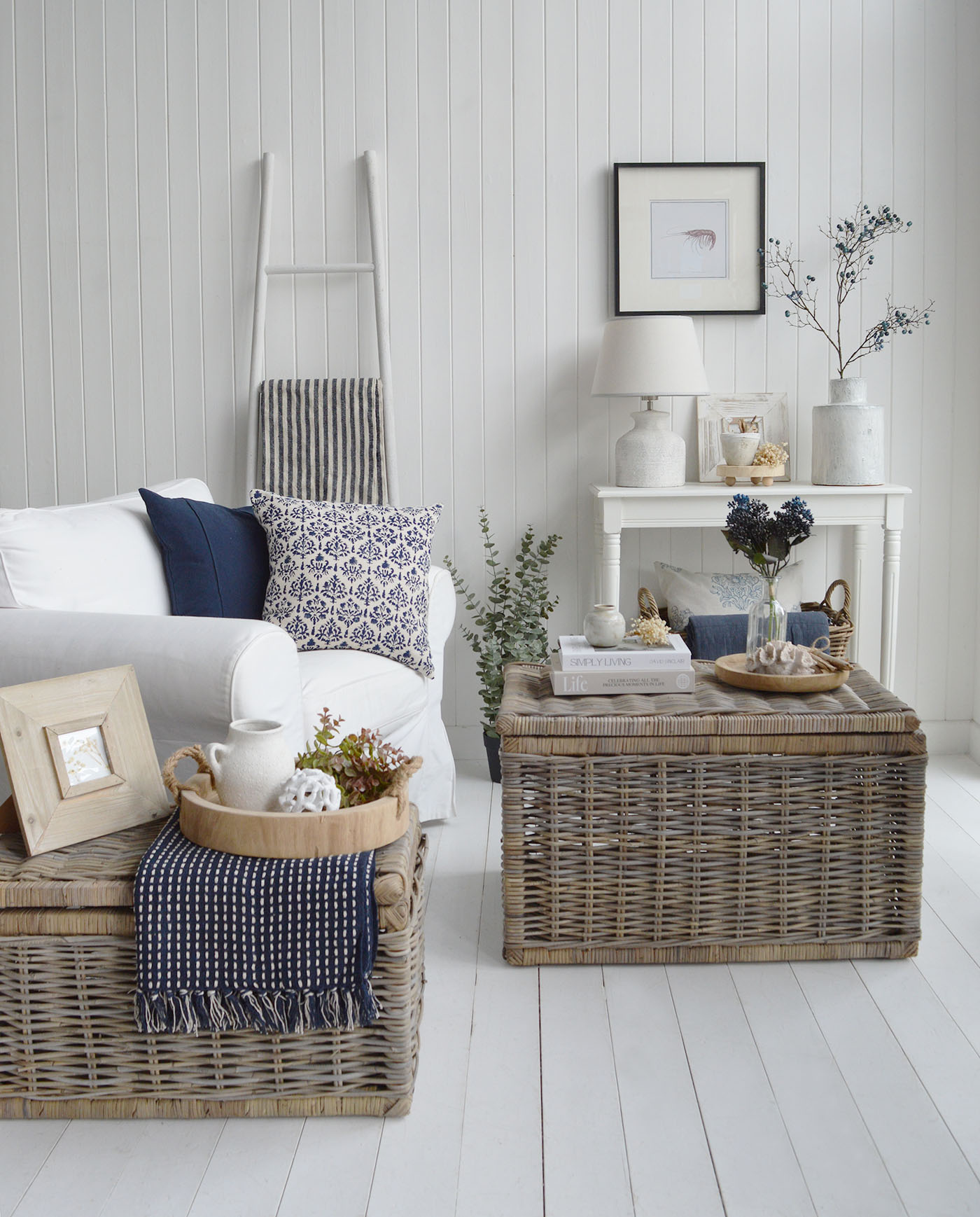 A timeless blend of navy and white tones, woven textures and rustic wicker furniture creates the perfect modern coastal, Hamptons and New England interiors look for relaxed yet elegant living spaces.