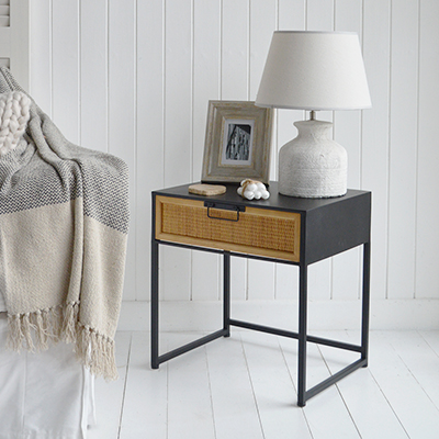 The Ascot bedside table combines a woven rattan drawer front with a sleek black metal frame, creating the perfect balance of coastal charm and modern style.