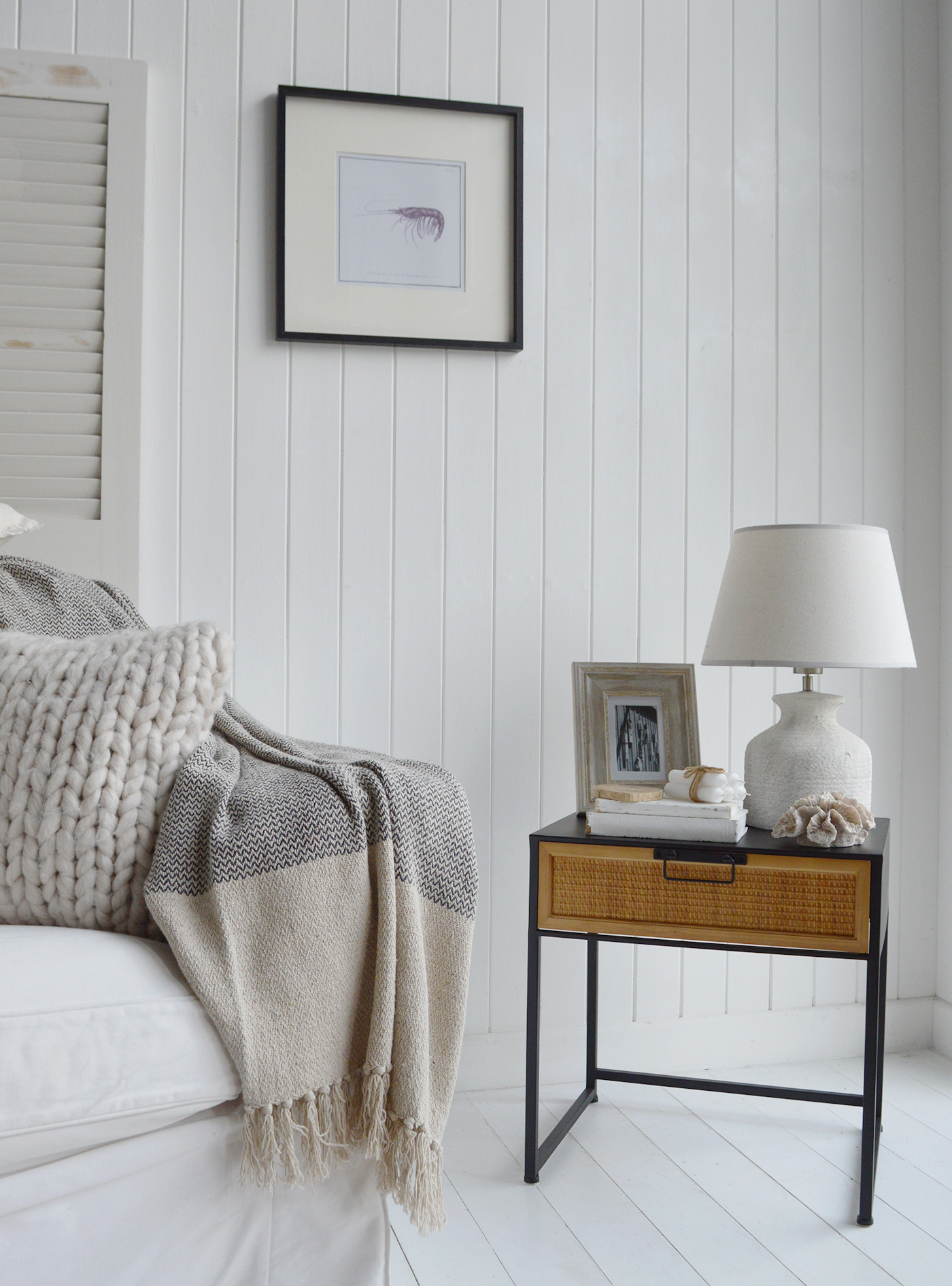 The Ascot coastal side table evokes the relaxed elegance of seaside living, with woven rattan and natural wood details that echo New England’s shoreline style.