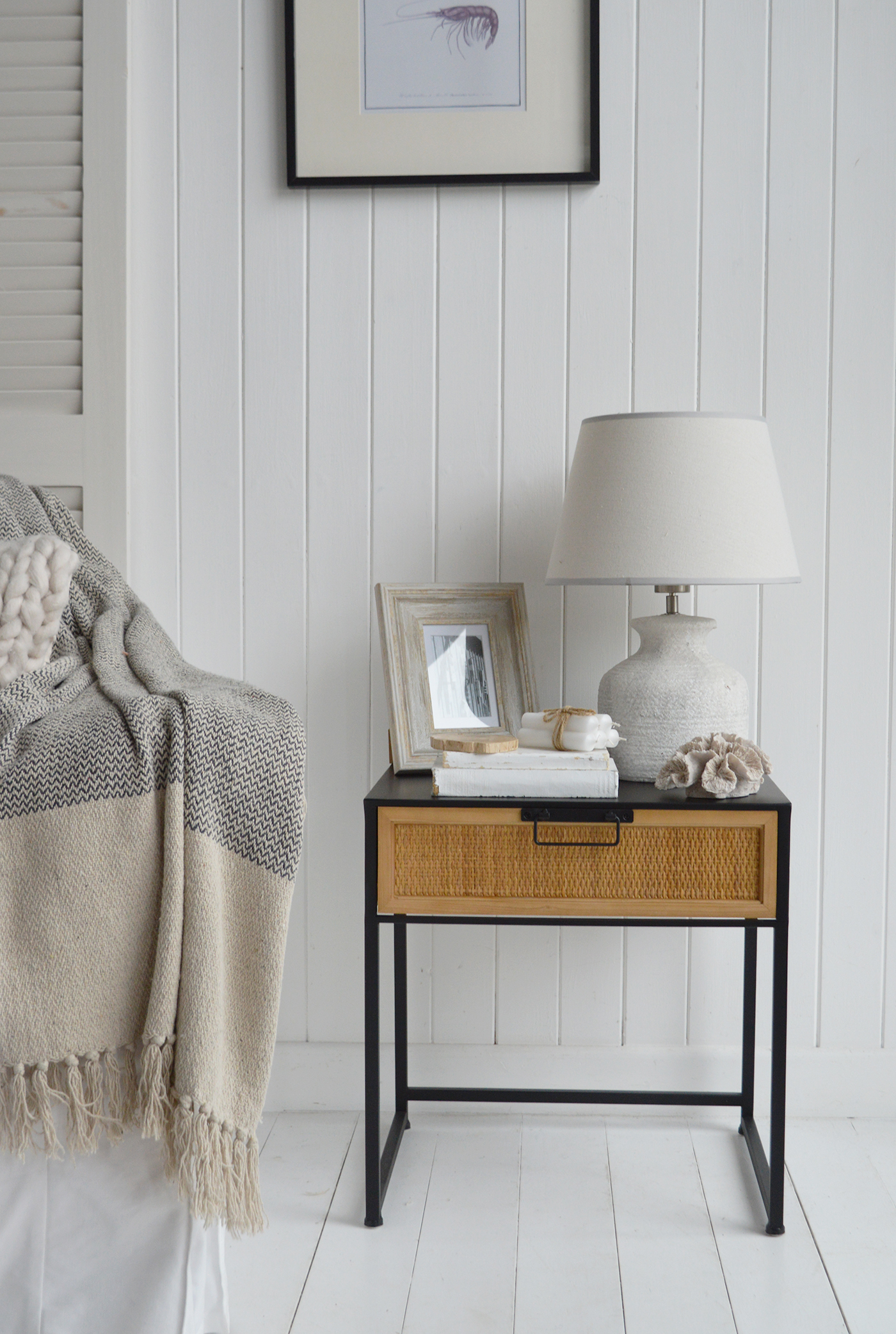 Inspired by New England interiors, this table features natural wood accents that bring timeless elegance to any spac