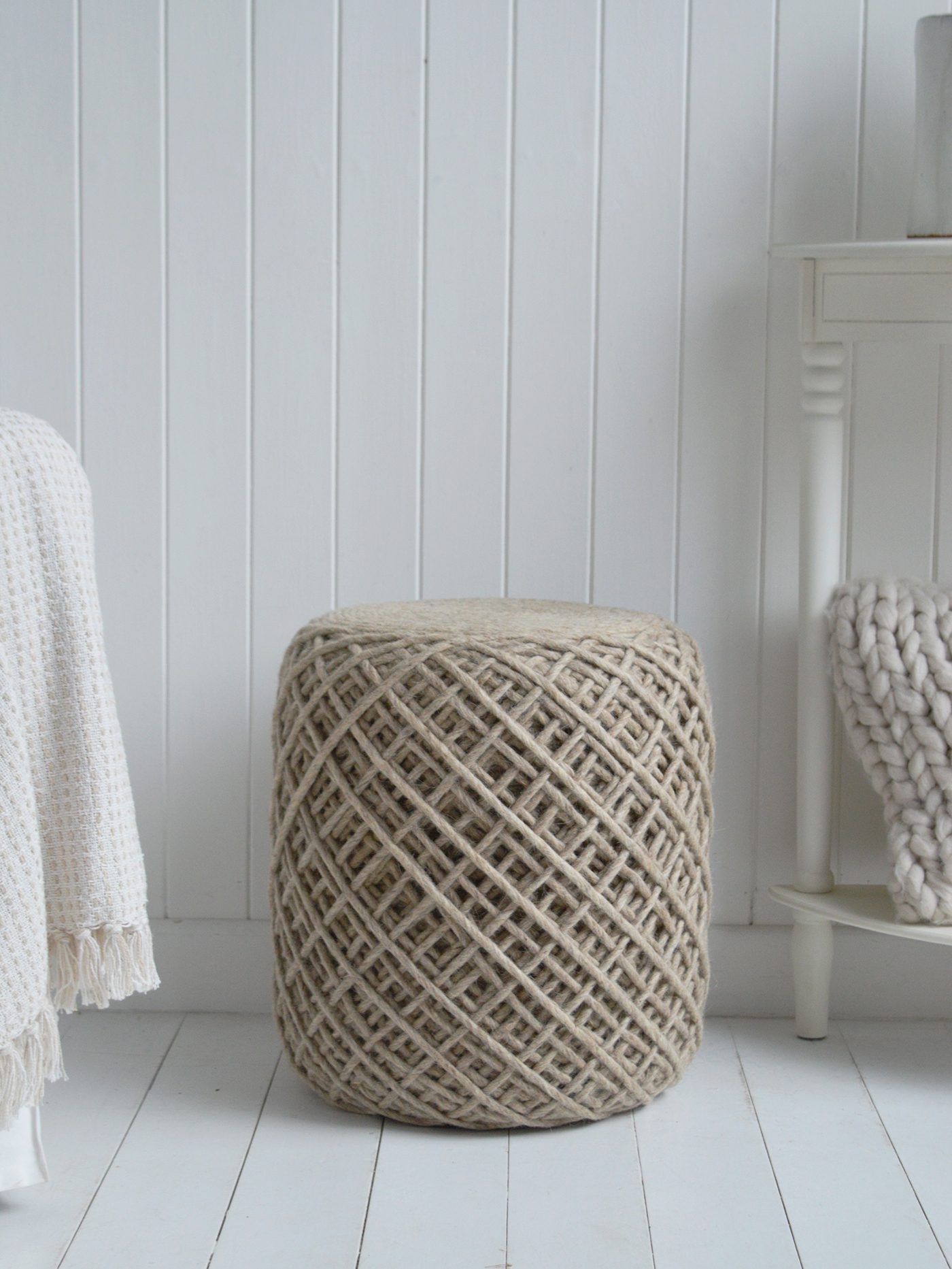 In soft tones of Pebble Grey and Coastal Hemp, this woven stool complements both relaxed beach house and modern farmhouse décor.