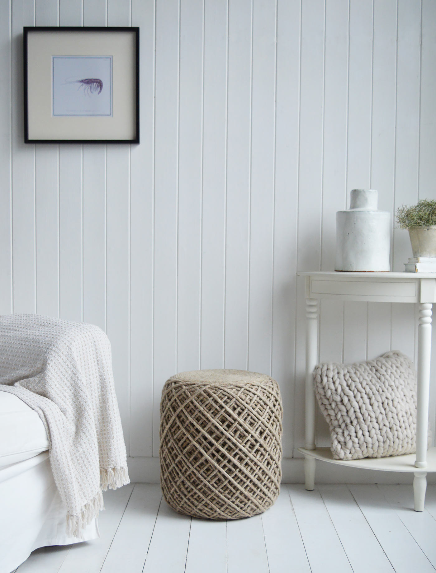 Pair the Bayport Weave Stool with soft linen furniture, driftwood tones, and woven baskets for a complete coastal look.