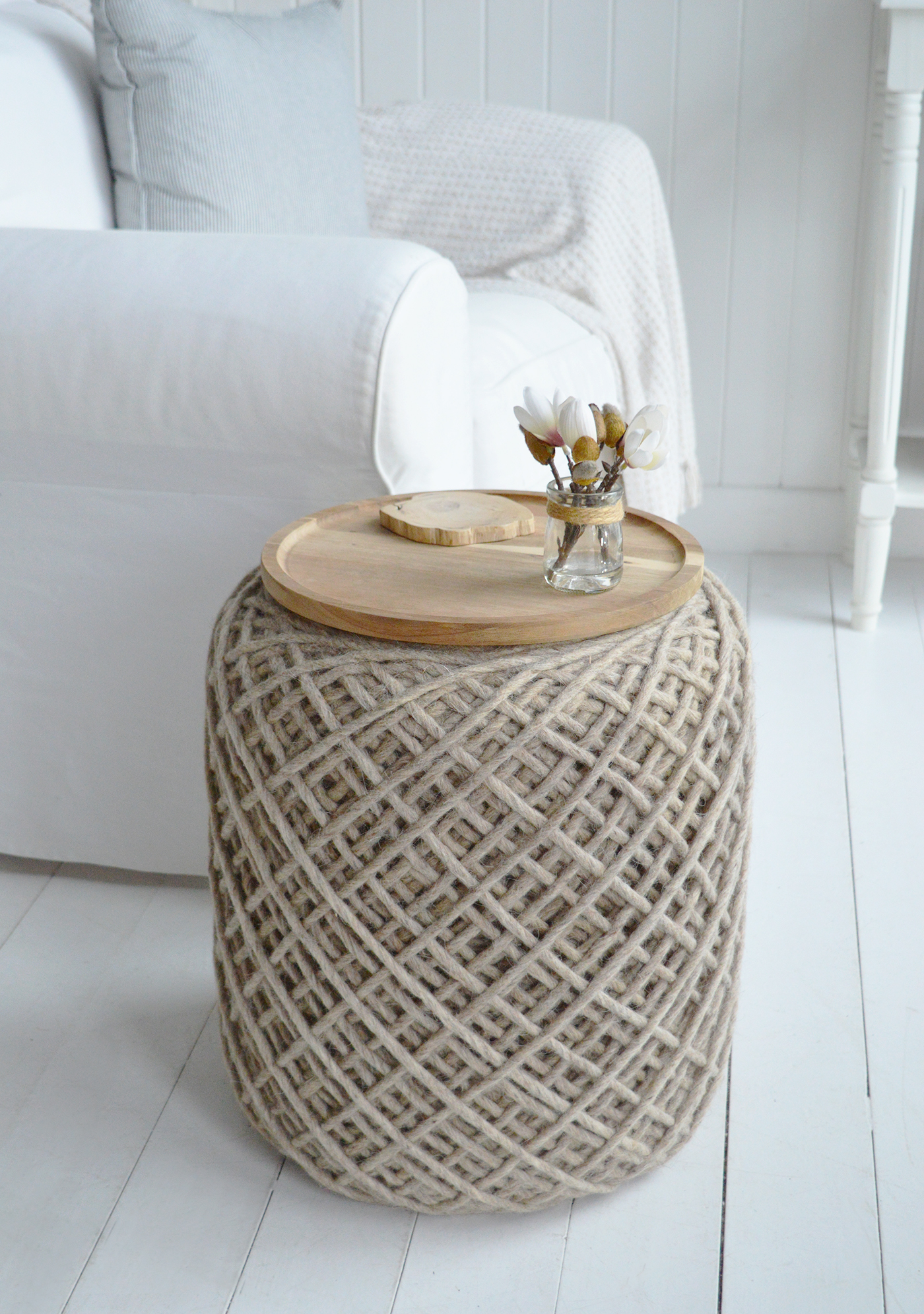 Whether used as a side table, footrest or accent piece, the Bayport Weave