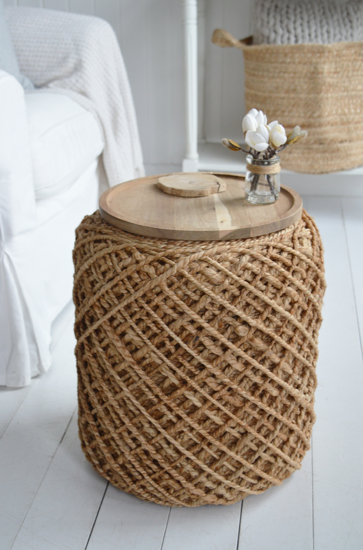 Designed with the signature Bayport criss-cross weave, this versatile stool offers both sculptural style and everyday function.