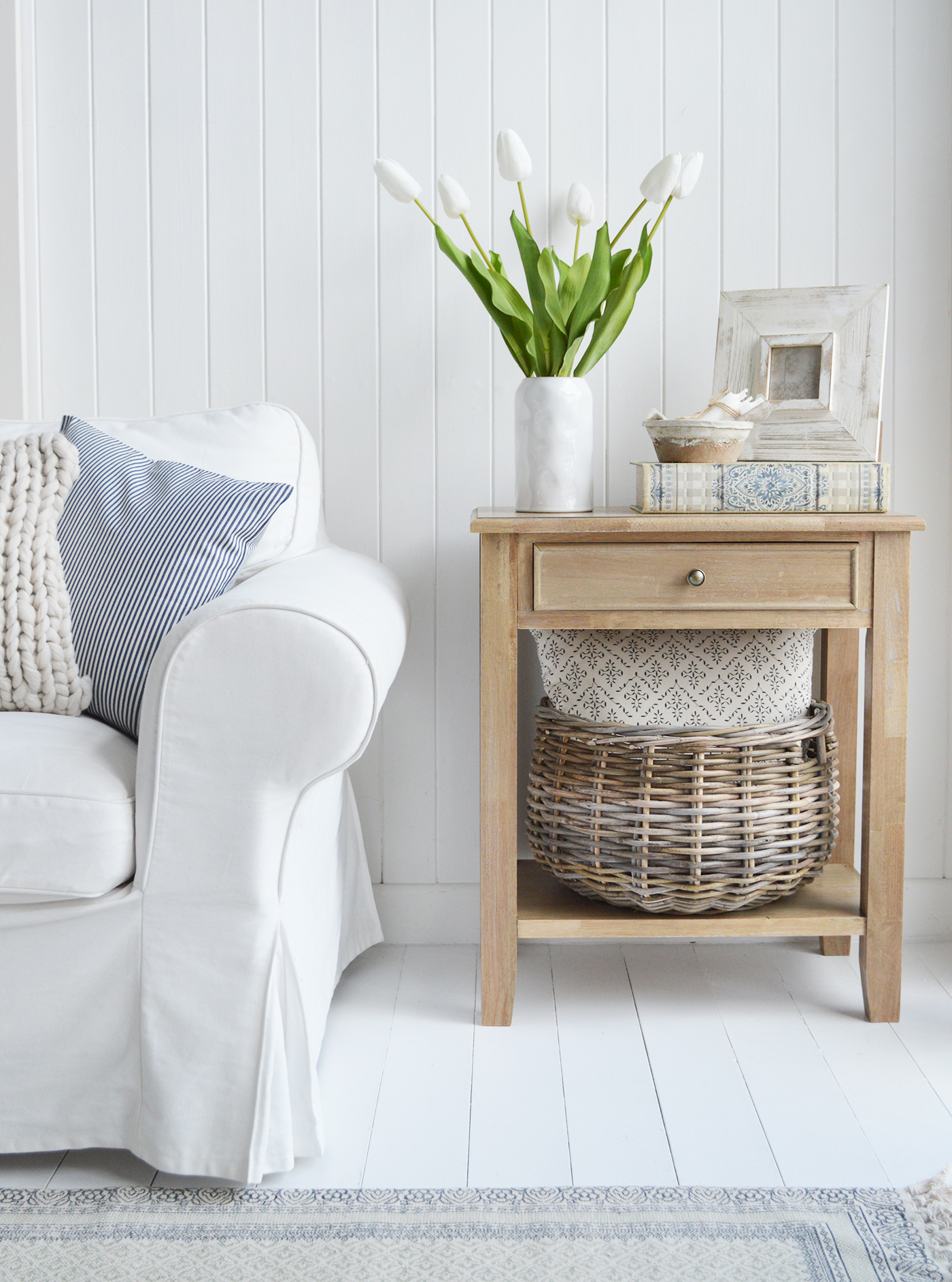 New England living room furniture. The Berkshire lamp table with baskets and home decor accessories to suit coastal, farmhouse and country styled homes and interiors