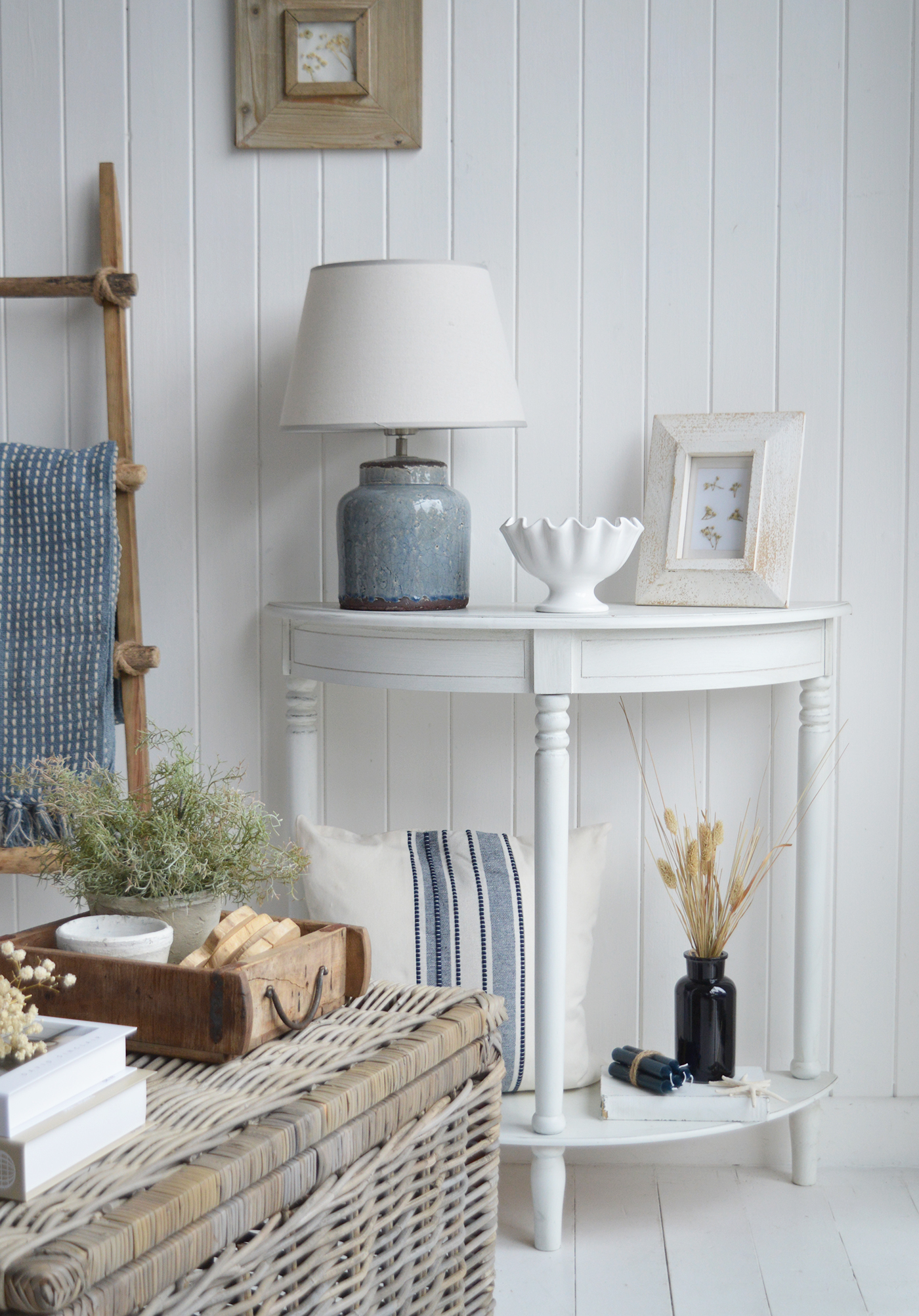 Weathered wood introduces rustic charm to this modern coastal living room.