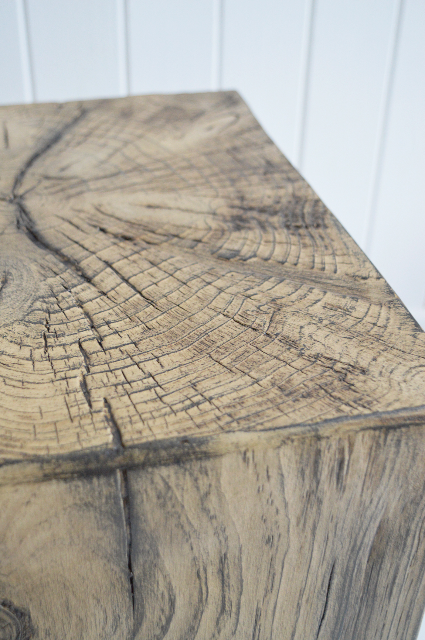 A versatile piece that works as a side table, lamp stand, or stool.