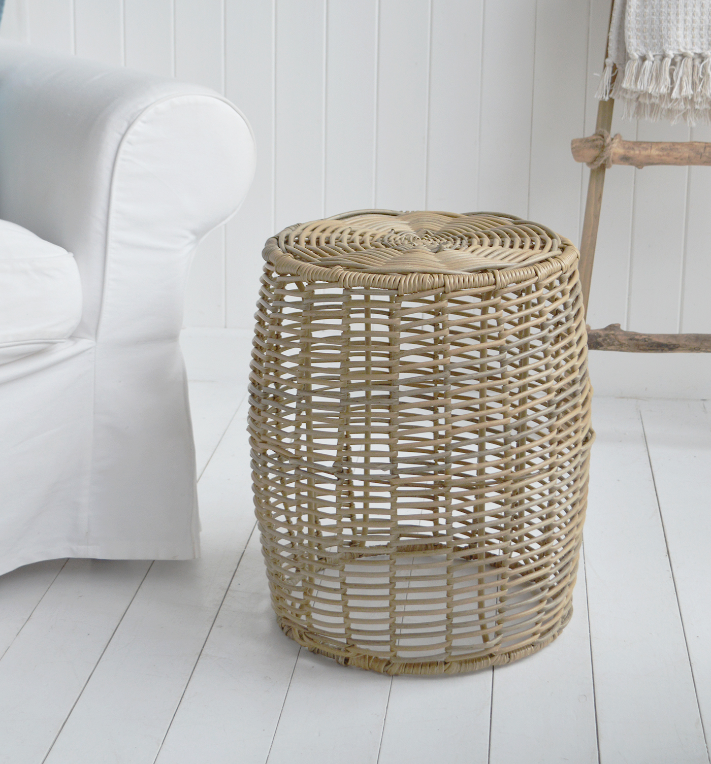 Use this versatile piece as an occasional stool or a small side table beside the sofa.