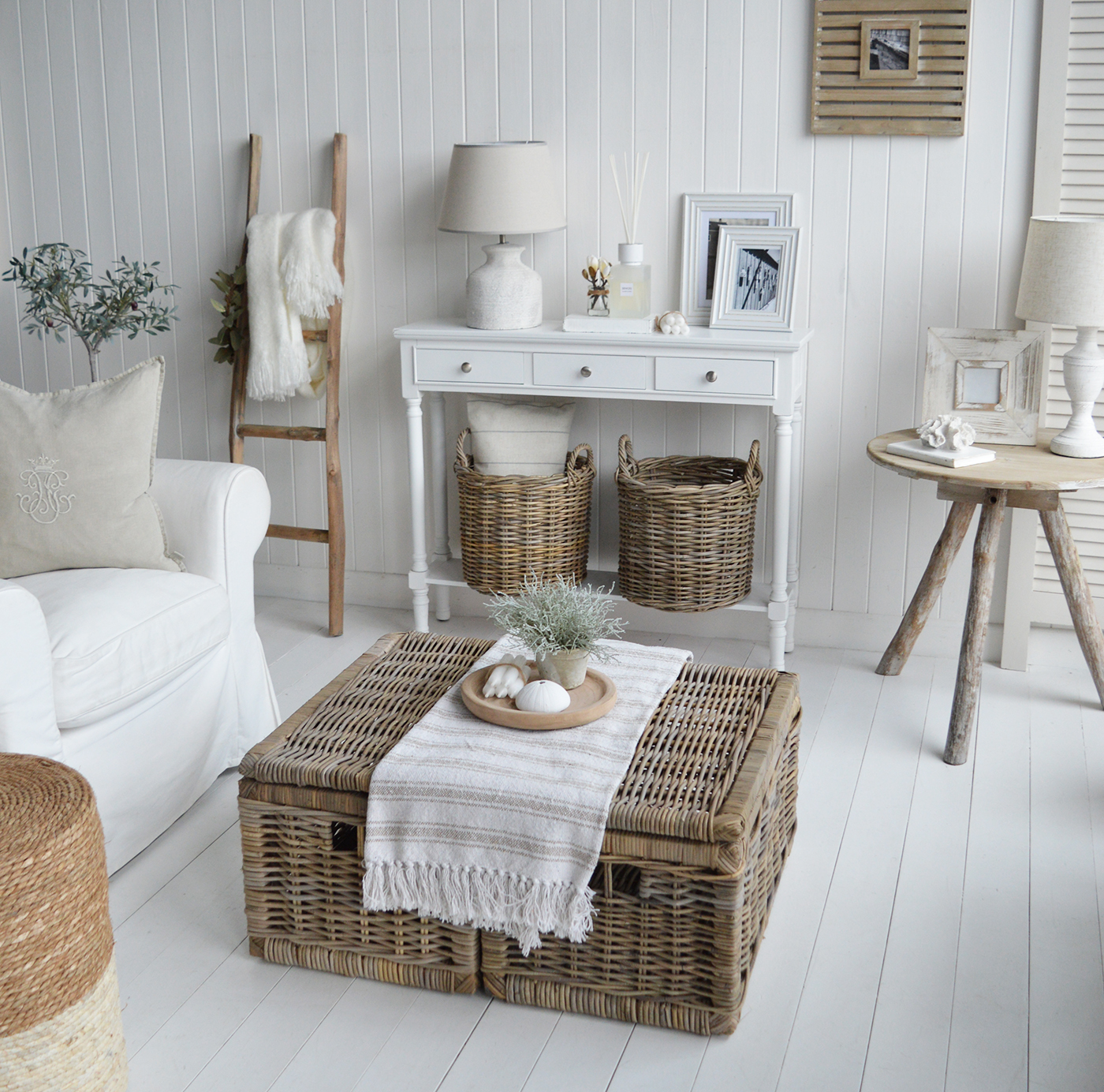 In this modern country farmhouse, the living room is decorated in a neutral style with two of the small Seaside coffee tables toget for a larger storage space