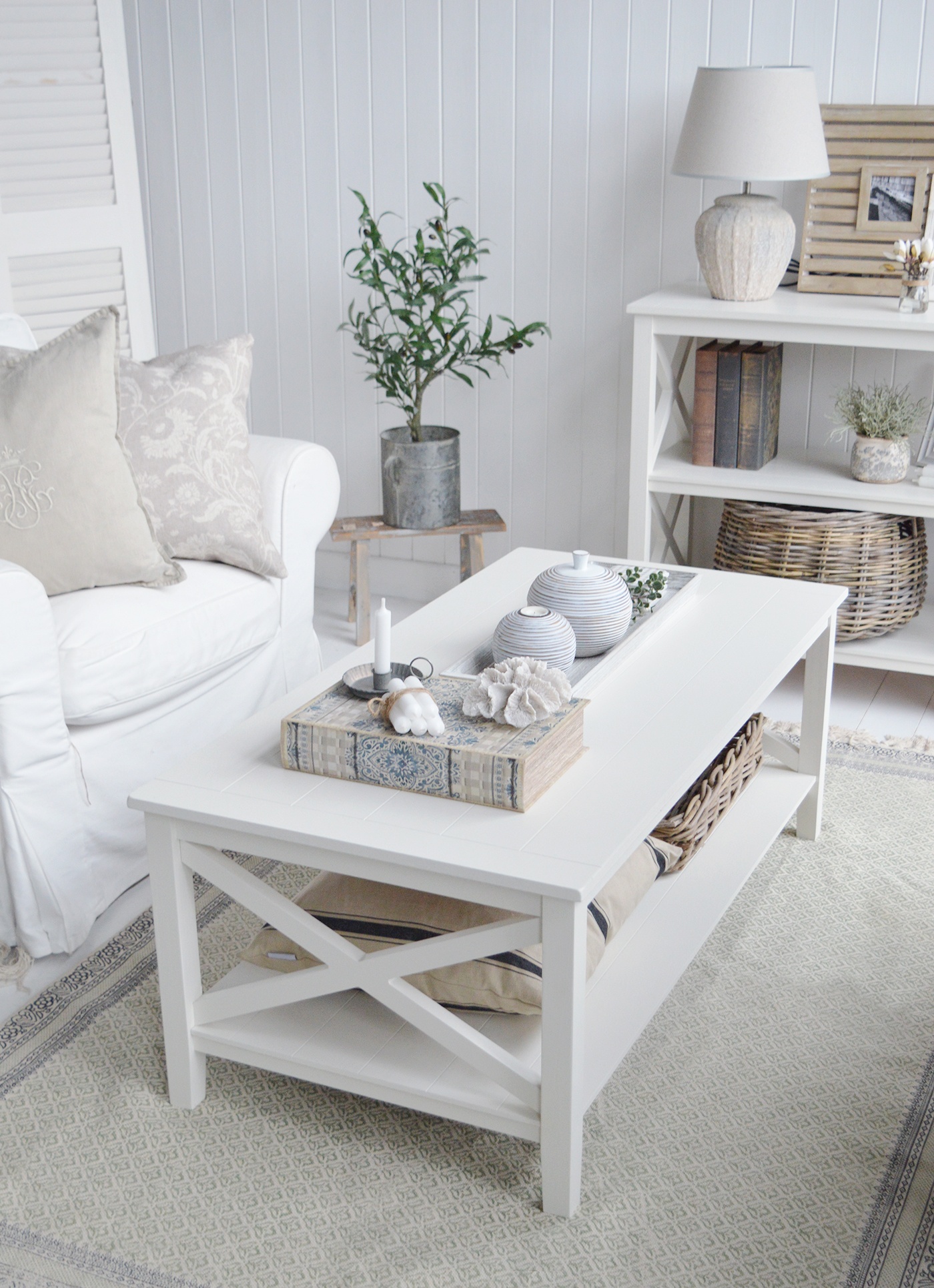 Cambridge ivory coffee table. A traditional style of coffee table with a shelf and clapboard finish to give a traditional coastal feel. With pleanty of space to style and the extra underneath storage, the Cambridge is a great choice
