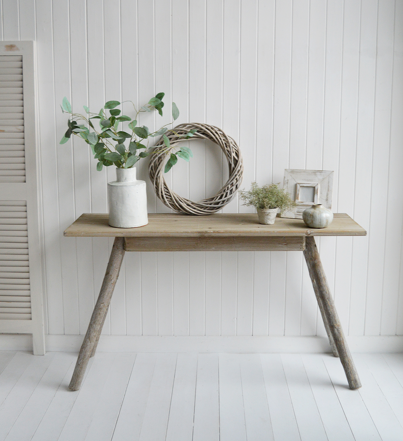 Crafted to resemble naturally aged driftwood, this exquisite piece brings a sense of coastal serenity and timeless elegance to any interior.