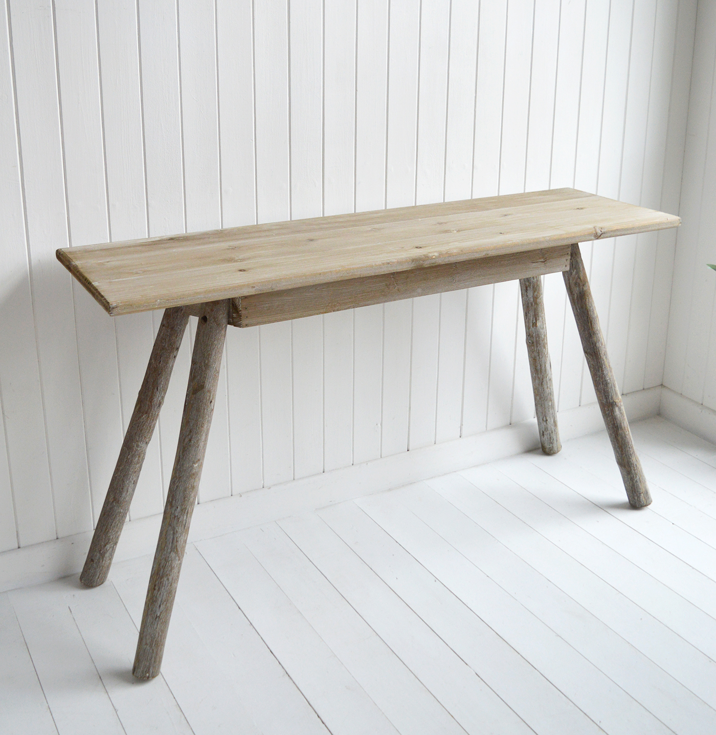The perfect fusion of nature and luxury, this driftwood effect console table is designed to elevate your home with understated elegance and coastal charm.
