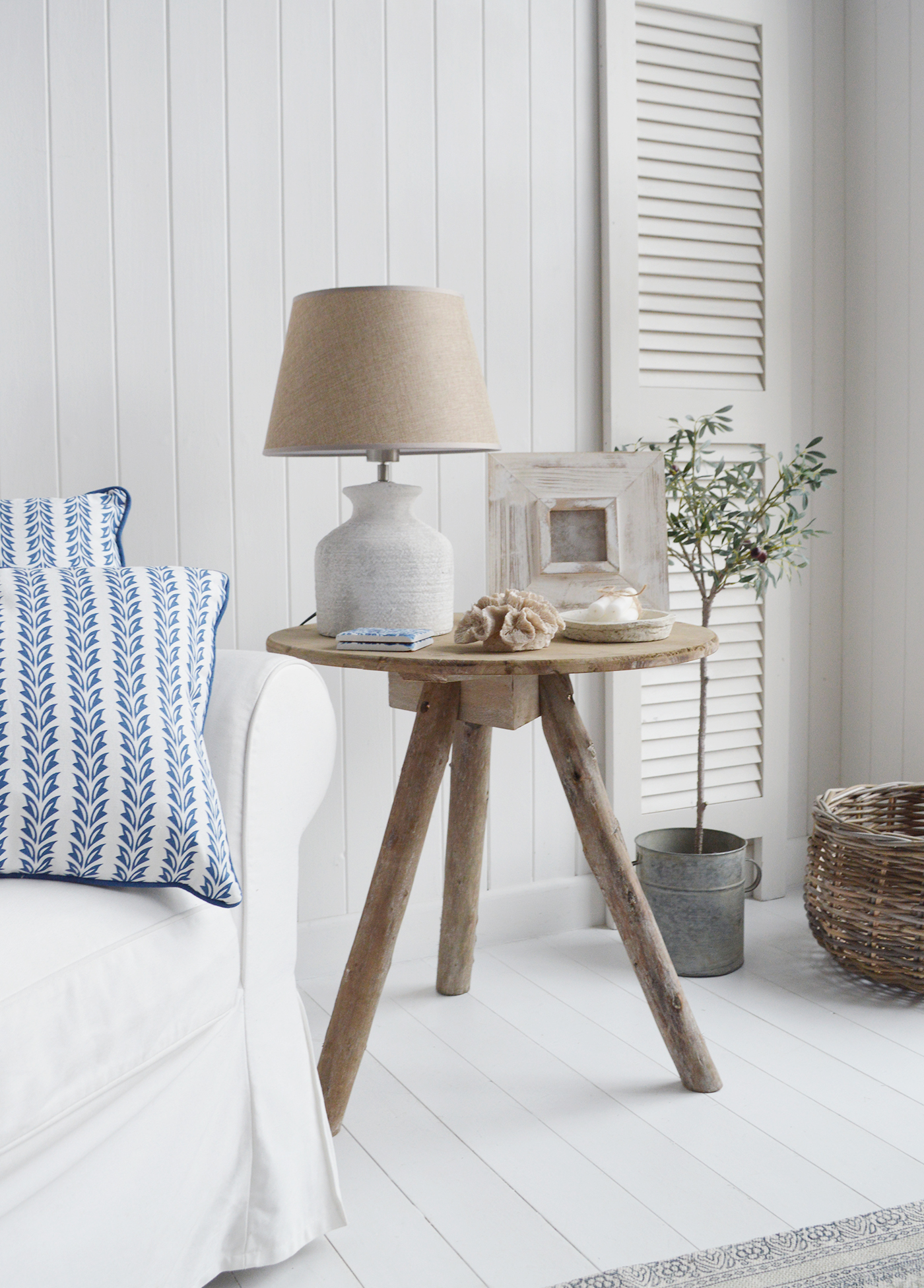 Artificial faux coral on our driftwood table for Hamptons chic coastal furniture and interiors