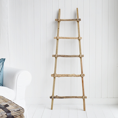 Add height and natural texture to your room with this driftwood wooden ladder. A simple way to display throws or towels in coastal and neutral interiors.