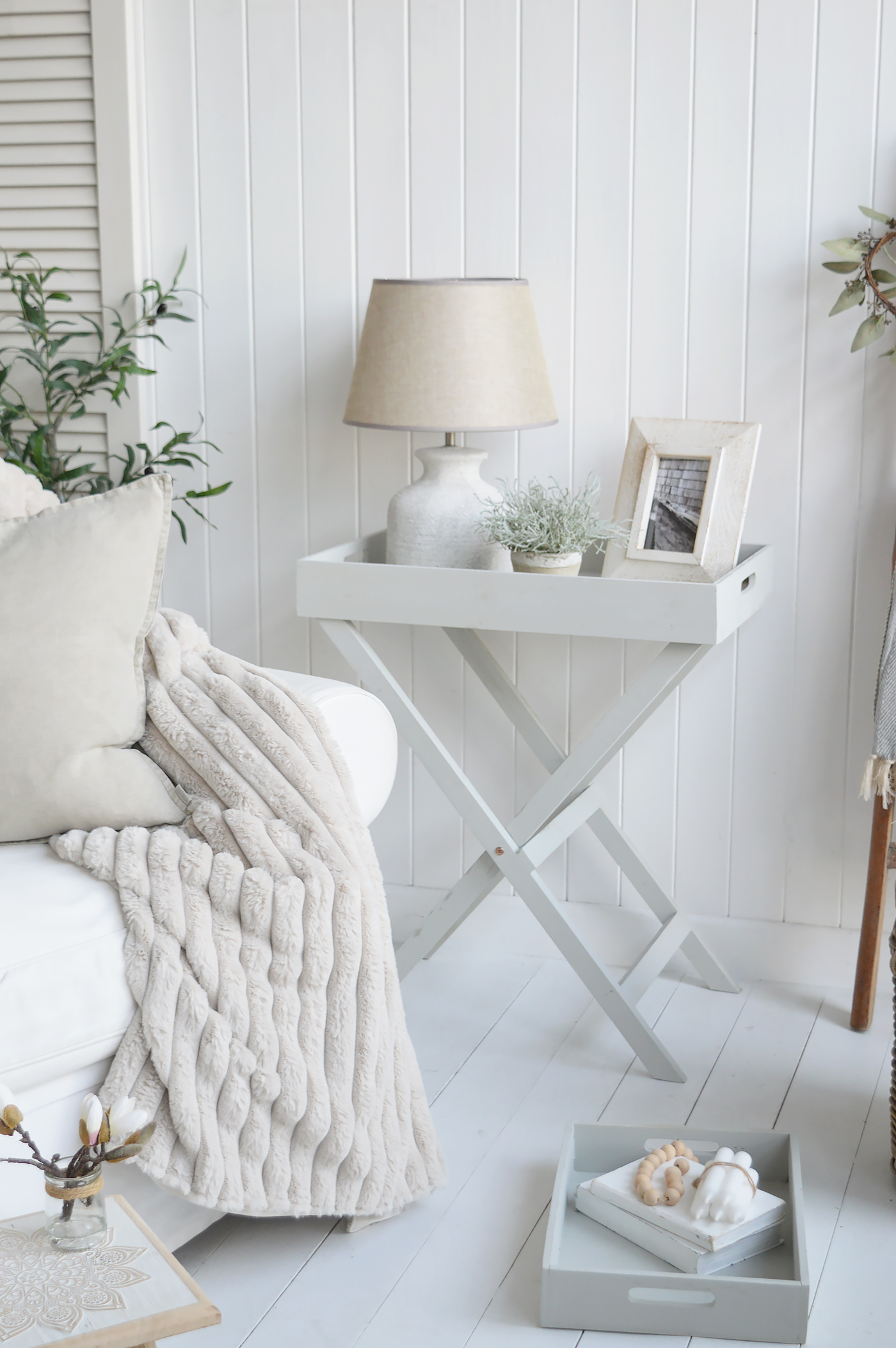 Fairfax table in grey rustic with three trays in a cosy New England style living room