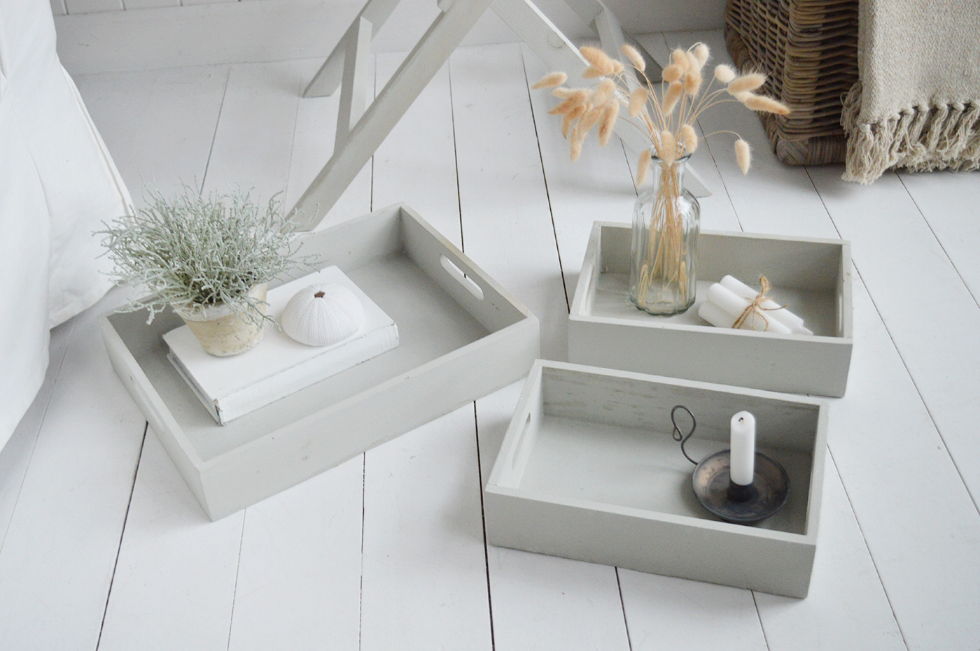 Elegant New England Coastal and Country Furniture. Finished in an aged grey paint with distressing, the Fairfax table is a butler tray table with three insert trays that can be used throughout the home for display