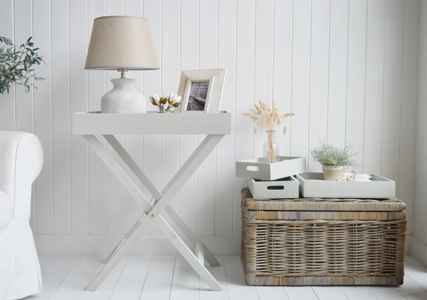 Elegant New England Coastal and Country Furniture. Finished in an aged grey paint with distressing, the Fairfax table is a butler tray table with three insert trays that can be used throughout the home for display