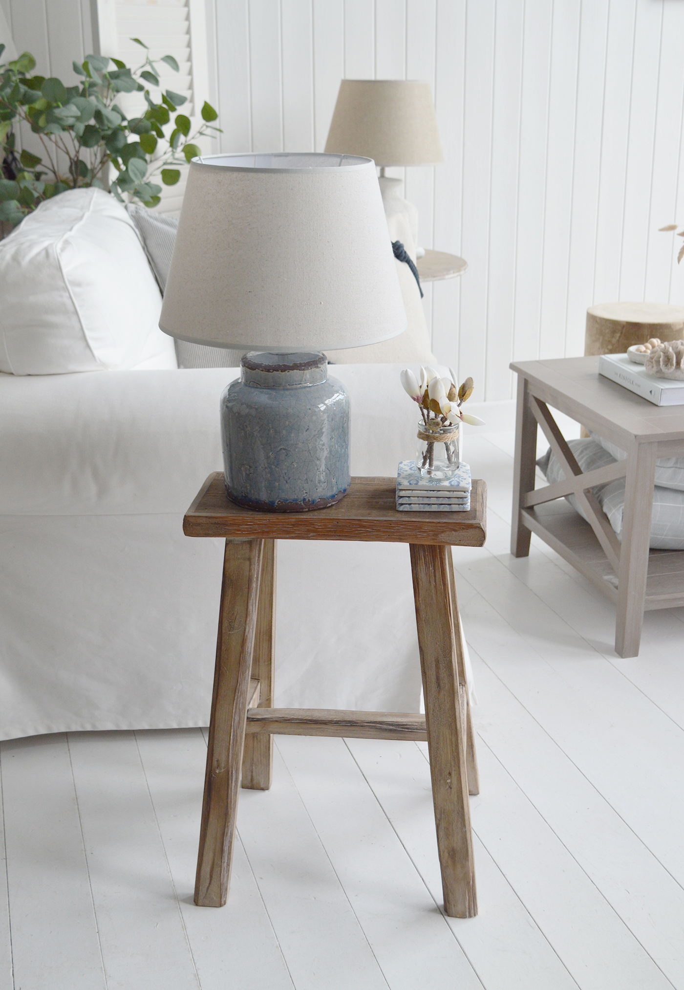 The Georgetown rustic wooden stool with our Hamptons style Blue Compton ceramic lamp... a lovely combination for coastal chic furniture and interiors