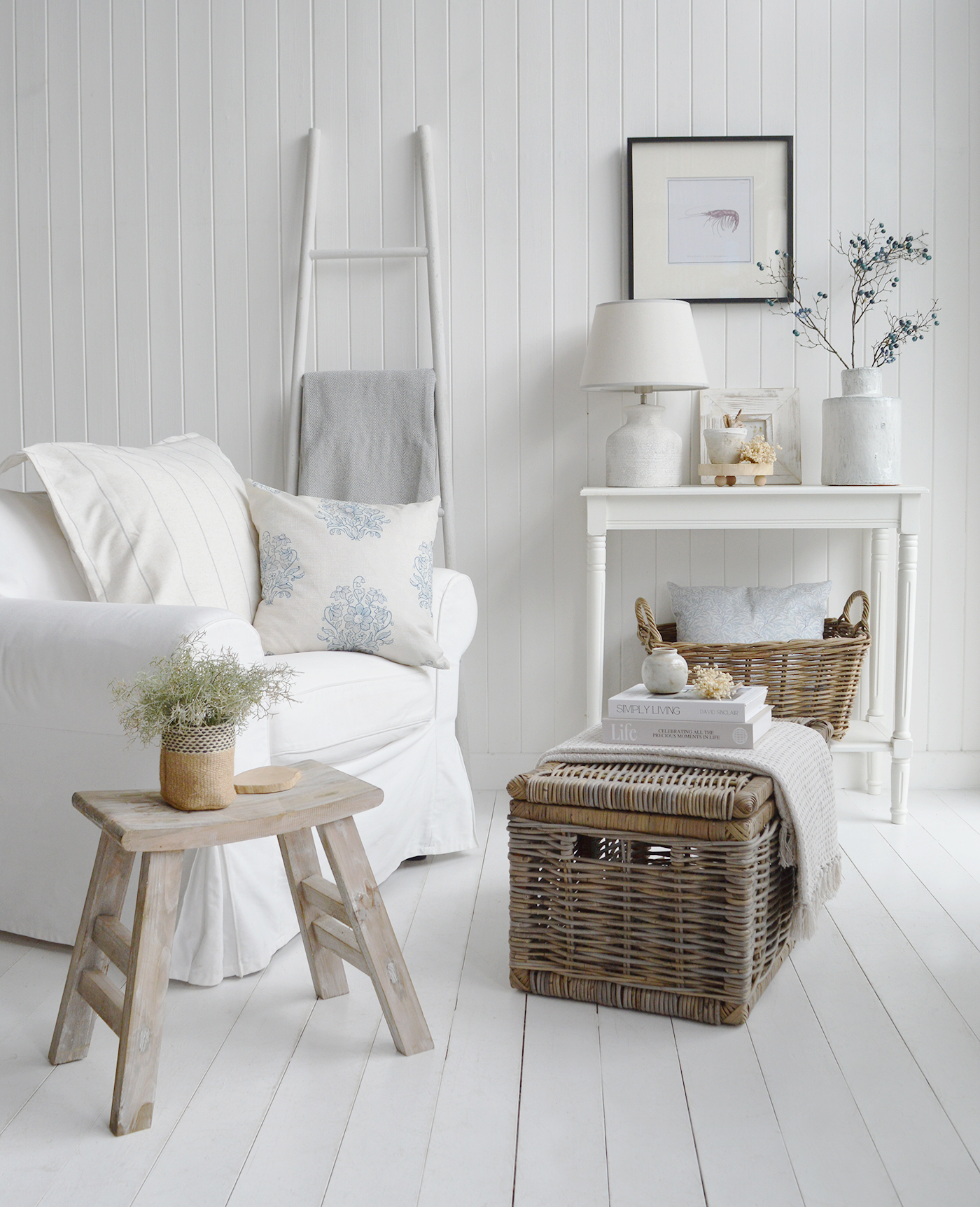 Create a calm and inviting Hamptons-inspired retreat with layers of soft neutrals, whitewashed wood, natural rattan textures and elegant coastal styling, bringing timeless New England charm and relaxed luxury to your living space.