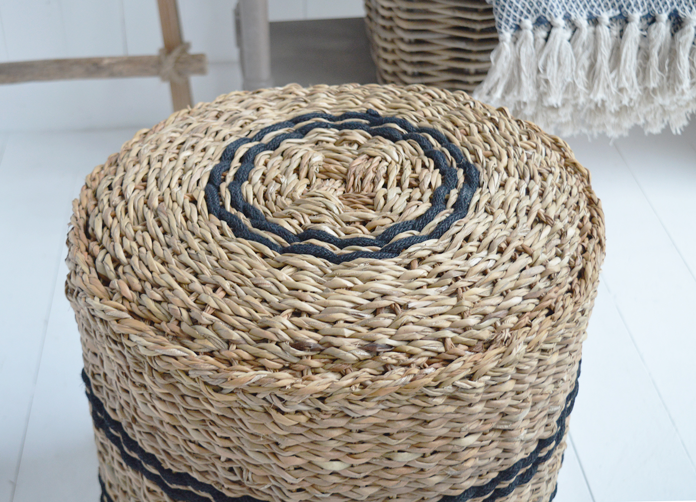 Styled with books and decorative accessories, the Harrington Pouffe makes a relaxed side table for a Hamptons styled home.