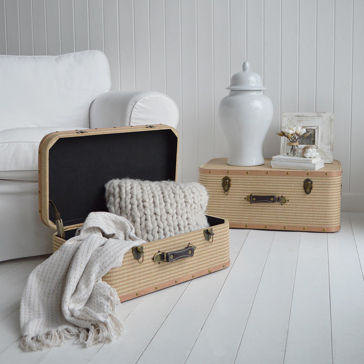 Whether placed at the foot of a bed or used as a statement coffee table, the Kennebunkport Trunks offer versatile, practical beauty for coastal and country homes alike.