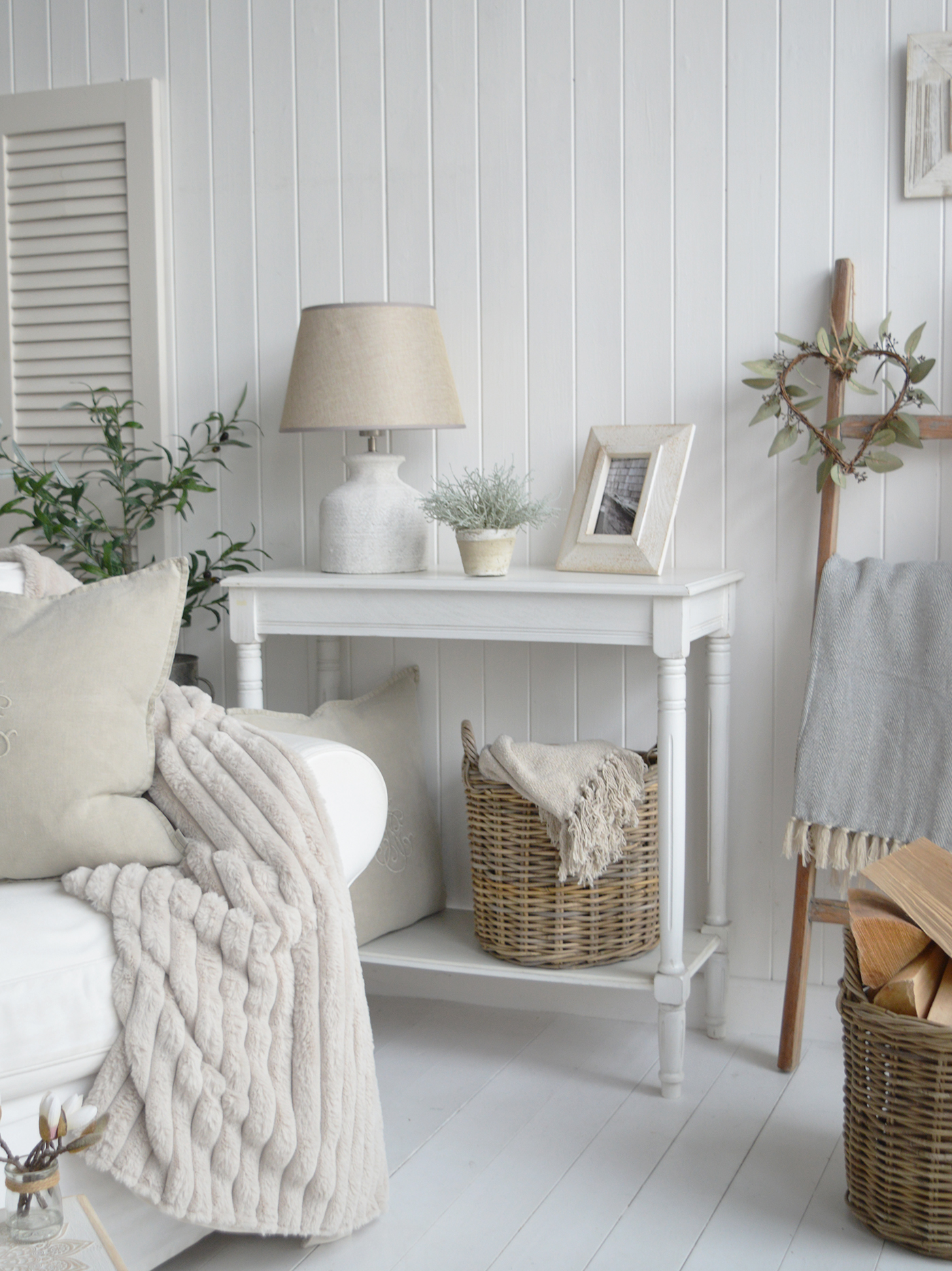 White console table in a living room New England beach house style